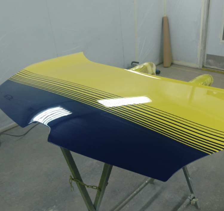 Bonnet painted yellow and blue with fade stripes